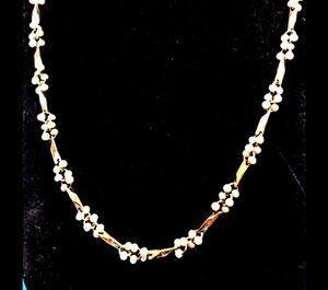 Elegant Gold and White Floral Necklace